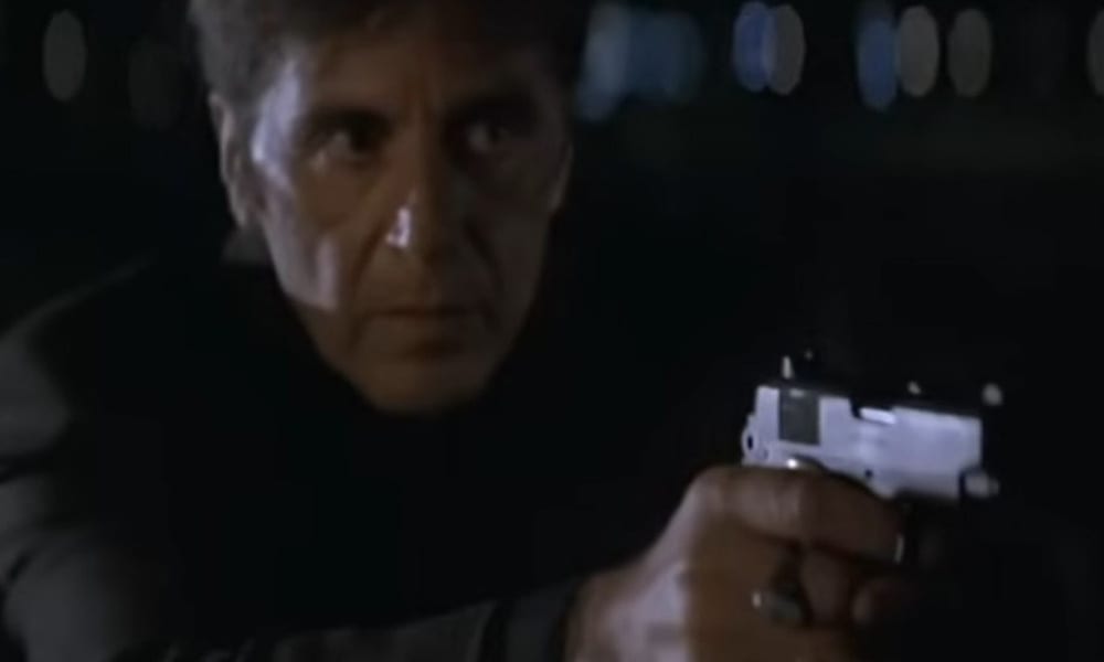 Vincent searches the airport with his 1911 drawn