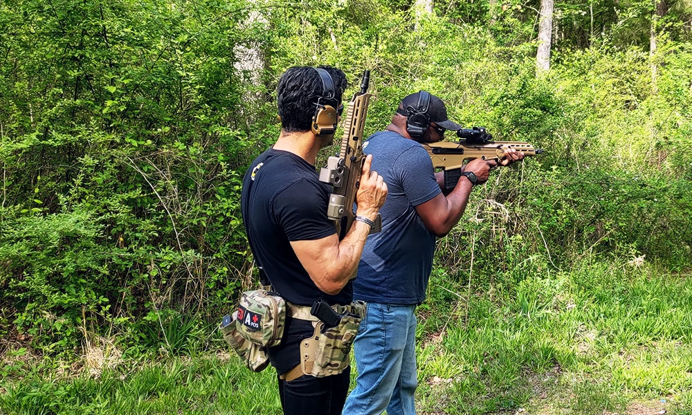 Jason and Kaya with the 5.56 NATO and 7.62 NATO WLVRN Bullpup