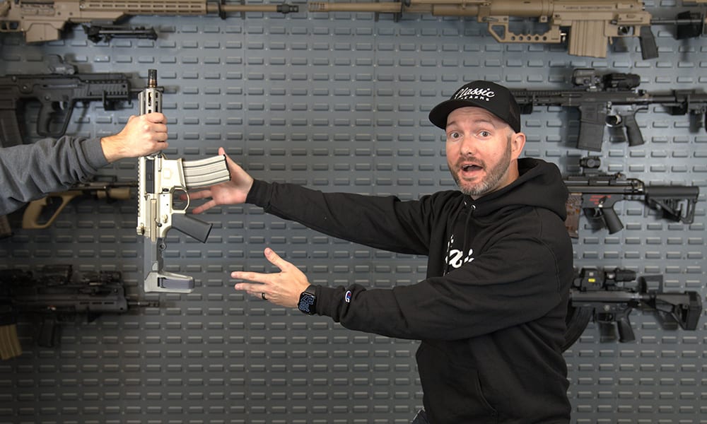 Josh receiving his gun from the FFL after purchasing online